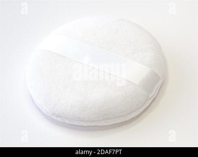 Isolated clean powder puff makeup application accessory for beauty salon and spa by makeup artist and beautician in cosmetology on white background cl Stock Photo