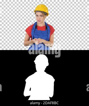 Construction female worket explaining her ideas to camera, Alpha Stock Photo
