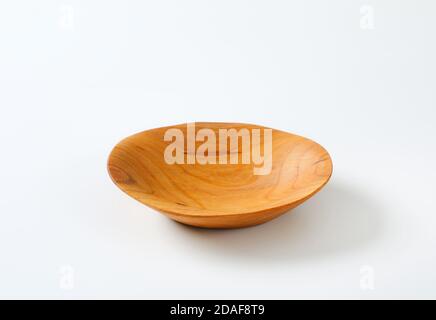 Empty oval shaped natural wood bowl Stock Photo