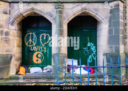 The belongings of someone sleeping rough left on the street. Stock Photo