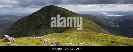 the Summit Cairn of Ill Bell fell, Hartsop valley, Kirkstone pass, Lake District National Park, Cumbria, England, UK Ill Bell fell is one of the 214 W Stock Photo