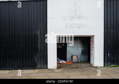 The belongings of someone sleeping rough left on the street. Stock Photo