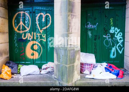 The belongings of someone sleeping rough left on the street. Stock Photo