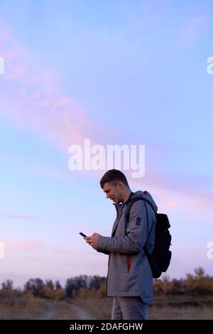Young man with smartphone Stock Photo