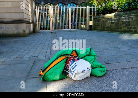 The belongings of someone sleeping rough left on the street. Stock Photo