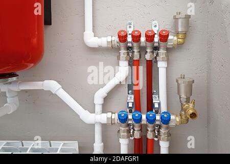 Main control manifold of house heating system Independent heating system in boiler room at home. Stock Photo