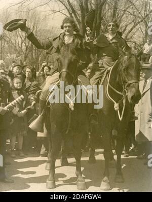 Antique c1935 photograph, actors portraying Paul Revere and William Dawes on horseback. Exact location unknown, possibly Lexington or Concord, Massachusetts on Patriots Day (April 19). SOURCE: ORIGINAL PHOTOGRAPH Stock Photo