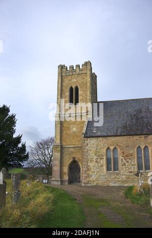 St Cuthbert's church in the village of Carham on Tweed, Northumberland, UK. Stock Photo