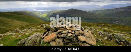 the Summit Cairn of Ill Bell fell, Hartsop valley, Kirkstone pass, Lake District National Park, Cumbria, England, UK Ill Bell fell is one of the 214 W Stock Photo