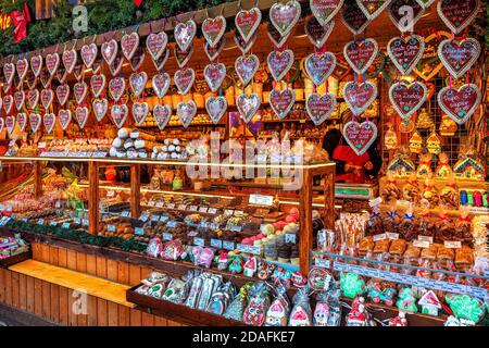 Heart-shaped gingerbread cookies, traditional sweets and candies at famous Christmas market in Vienna, Austria. Stock Photo