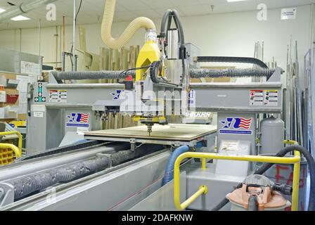 A horizontal multi-axis router in machine shop. Stock Photo