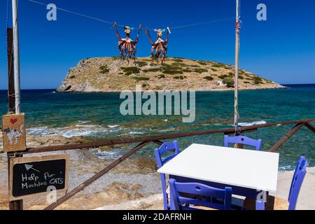 Freshly caught Octopus hanging and drying in the sun on a Greek island (Mochlos, Crete) Stock Photo