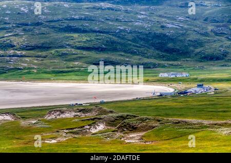 Elevated view of Barra airfield on the sandy beach of Traigh Mhor. Stock Photo