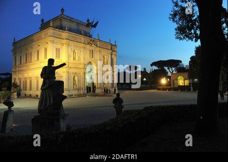 night view at dusk of the Algardi cottage inside the public park of Villa Pamphili in Rome, Italy Stock Photo
