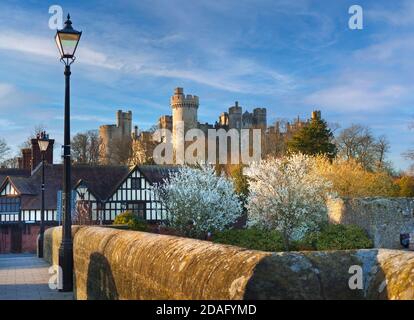 Arundel Castle in Arundel, West Sussex, England a restored medieval castle with fresh spring colour in late afternoon sunset sunlight UK Stock Photo