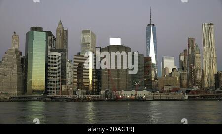 East river and Manhattan skyline with view of urban skyscrapers early Morning, new york Stock Photo