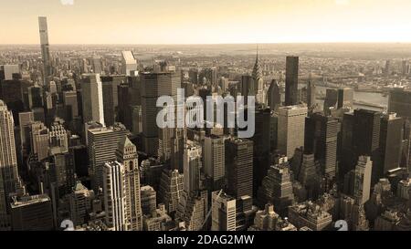 Aerial view of Manhattan skyline panorama, urban skyscrapers in sepia toned, New York City, USA
