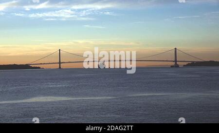 ship passing under the Golden Gate Bridge in San Francisco, USA Stock Photo