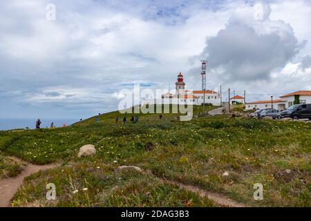 Sintra/ Portugal-June 1st, 2017: Cabo da Roca lighthouse above the Atlantic ocean, most western point of european land with only deep blue sea all the Stock Photo