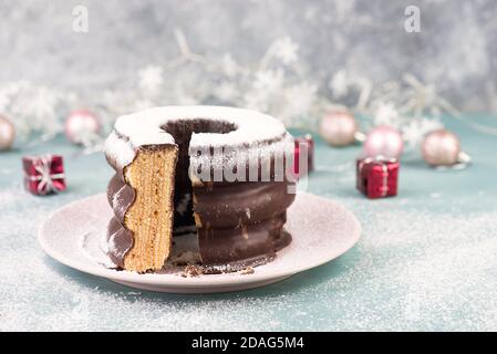 Traditional german christmas chocolate cake called Baumkuchen, winter season sweets Stock Photo