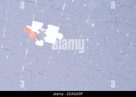 Jigsaw Puzzle Last Piece to Complete. Assembling Jigsaw Puzzle. Part of the Whole. Completing Task. Business Solution Concept. Full Understanding of Stock Photo