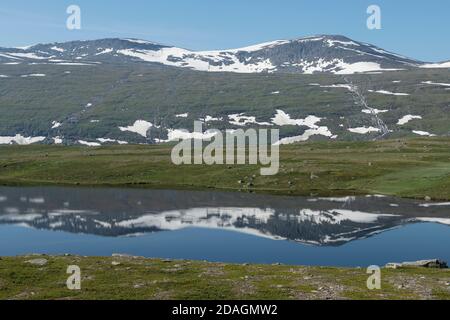 Moutain reflection in lake along Padjelantaleden Trail in Padjelanta national park, Lapland, Sweden Stock Photo