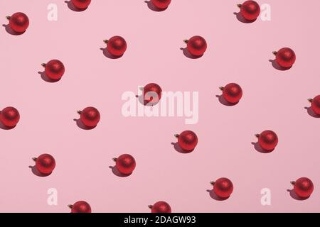 Christmas balls decoration pattern on pink background. Christmas, New Year, winter holidays concept. Stock Photo