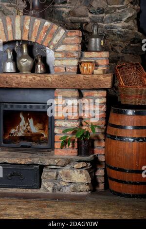Wall clock hanging in a cozy cafe setting in the evening Stock Photo ...