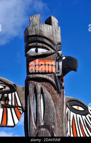 A vertical image of a native bird totem pole in Jasper Natural Park Alberta Canada Stock Photo