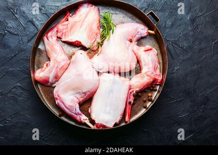 Pieces of raw rabbit meat in tray.Fresh piece of rabbit Stock Photo