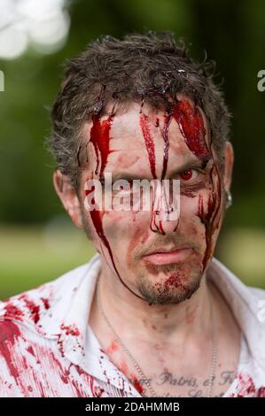 People learning how act like a zombie at a zombie training day, Hyde Park, London, The training was organised by 'Zombie Evacuation Races' who who run Britain biggest Zombie event.  Hyde Park, London, UK.  18 Aug 2013 Stock Photo