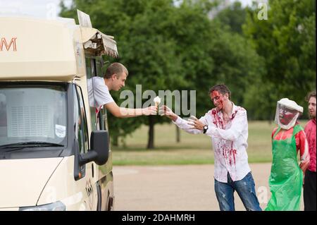 People learning how act like a zombie at a zombie training day, Hyde Park, London, The training was organised by 'Zombie Evacuation Races' who who run Britain biggest Zombie event.  Hyde Park, London, UK.  18 Aug 2013 Stock Photo