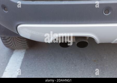 exhaust pipe and back part of new car Stock Photo