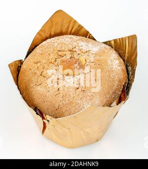 Orange muffin with candied fruits on a light background. Close up image Stock Photo