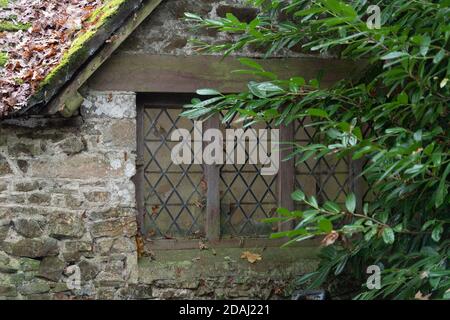 leaded lights windows in old cottage UK Stock Photo