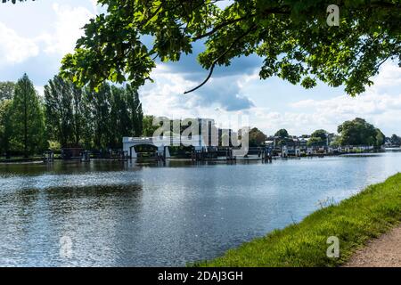 Approach to the complex of three locks and a weir on the River Thames between Ham and Teddington. Stock Photo