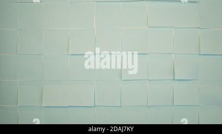 Blue stickers wallpaper. Empty paper sticky, notepapers Stock Photo