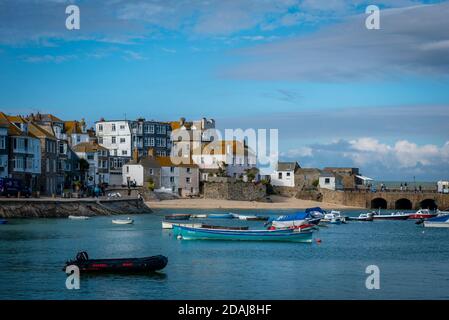Boats in St Ives harbour at high tide, Cornwall, UK Stock Photo