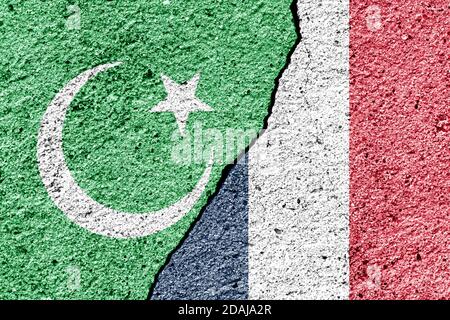 The crack between France and Islamic flags. The concept of islamic conflict, religios crisis and confrontation. Stock Photo