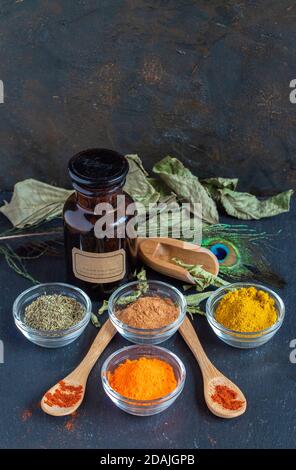 Colorful spices on black background Stock Photo