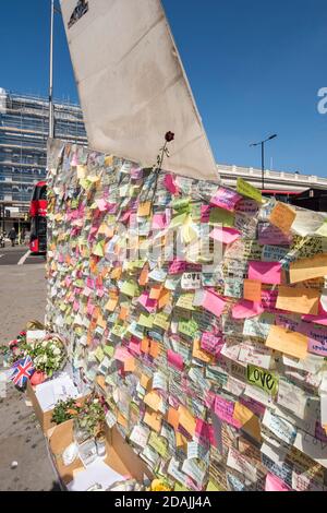 View looking west with post-it notes as tributes stuck to the base of the needle as tributes to the terror attack victims of June 2017. Southwark Gate Stock Photo