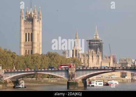 A crop of Lambeth Bridge with the Palace of Westminster seen in the background during a sunny autumnal day. Stock Photo