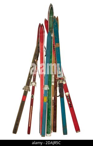 Vintage collection of different used skis isolated on a white background Stock Photo