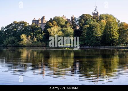 St Michael’s Parish Church tower and Linlithgow Palace reflections in Linlithgow Loch in historic town of Linlithgow in West Lothian, Scotland, UK Stock Photo