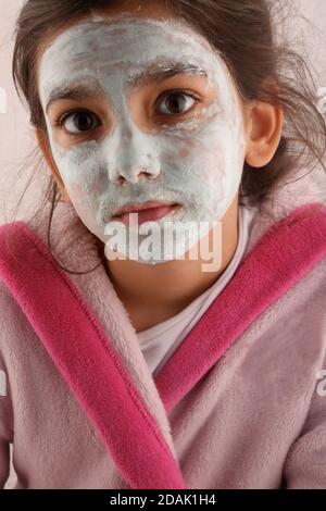 girl with face care mask cream Stock Photo