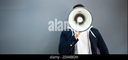 Man Hand Holding Megaphone. Attention Loud Shout Stock Photo