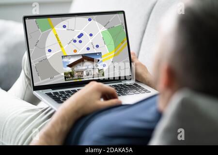 Searching Real Estate House Or Apartment Online Stock Photo