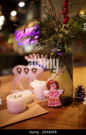 Minimalistic Christmas decor cozy warm room with wooden furniture. Stock Photo