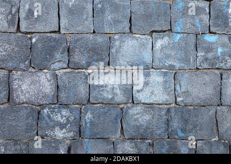 wall in blocks of volcanic stone. Ideal for backgrounds and textures Stock Photo