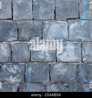 wall in blocks of volcanic stone. Ideal for backgrounds and textures Stock Photo